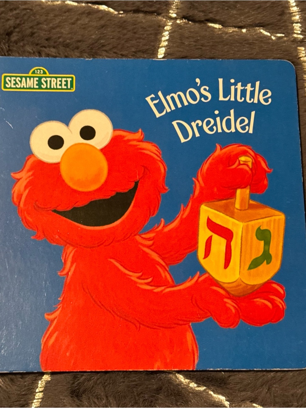 Sesame Street Elmo’s Little Dreidel Baby Board Book